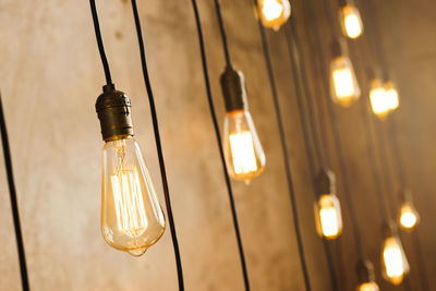 Close-up of illuminated light bulb