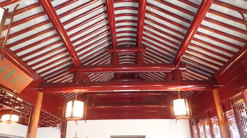 Low angle view of illuminated ceiling in building