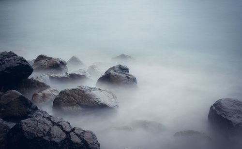 Scenic view of rocks against sky