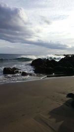 Scenic view of beach against sky