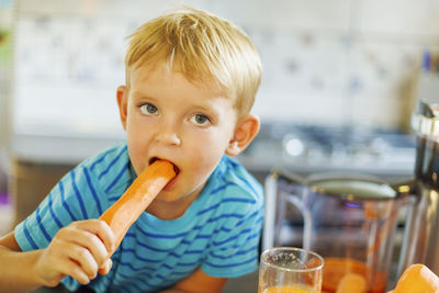 Close-up of cute girl eating food