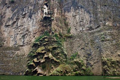 View of rock formations in river