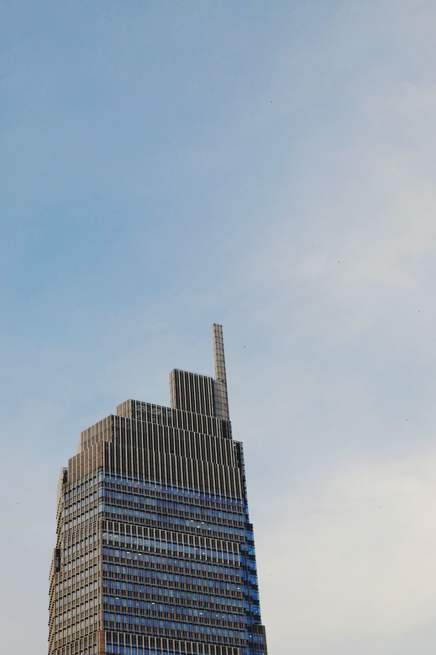 built structure, building exterior, office building exterior, architecture, sky, building, city, office, skyscraper, tall - high, low angle view, modern, no people, tower, nature, day, outdoors, development, business, copy space, financial district