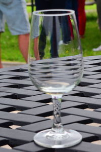 Close-up of wine glasses on table