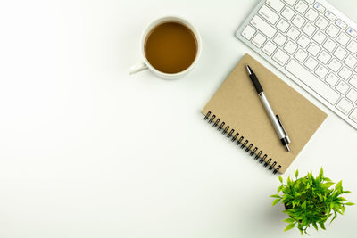 High angle view of coffee cup on table