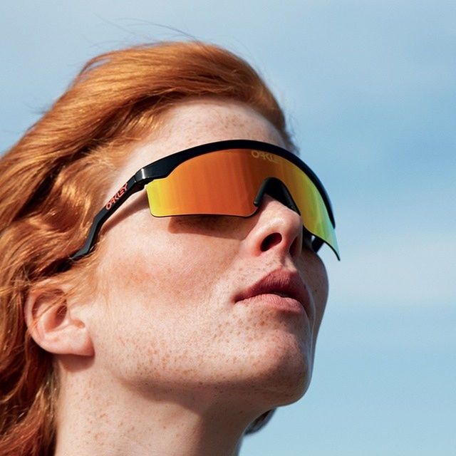 headshot, close-up, person, lifestyles, leisure activity, young adult, front view, sunglasses, portrait, human face, head and shoulders, looking at camera, white background, part of, sky, clear sky, studio shot