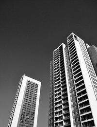 Low angle view of modern buildings against clear sky