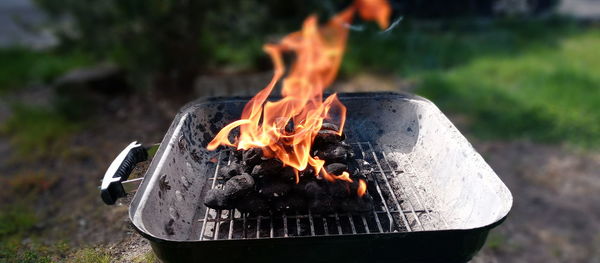 Close-up of bonfire on field