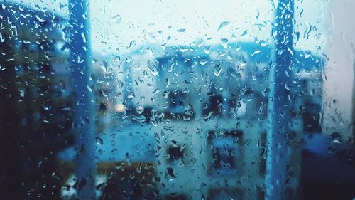 Full frame shot of wet window in rainy season