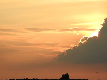 Scenic view of dramatic sky during sunset