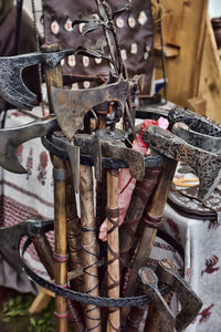 Close-up of padlocks hanging on metal