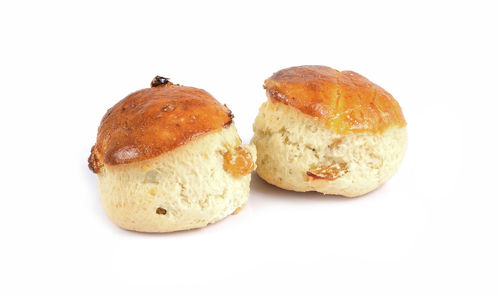 Close-up of cake against white background