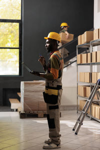 Rear view of man standing in gym