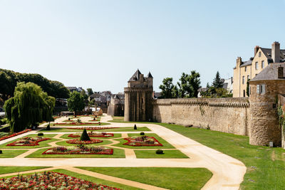 View of historical building in garden