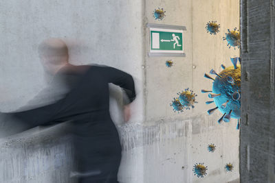 Shadow of man on wall of building