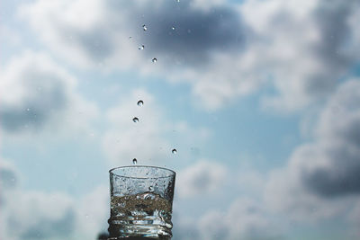 Close-up of water splashing on glass
