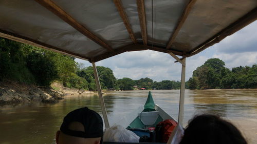 Scenic view of river seen through boat
