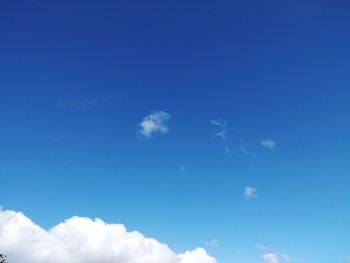 Low angle view of clouds in blue sky