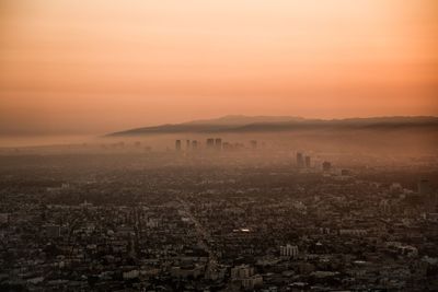 View of cityscape at sunset