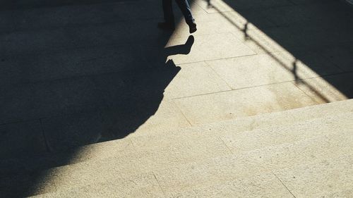 Shadow of woman on wall