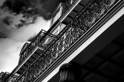 Low angle view of building against cloudy sky