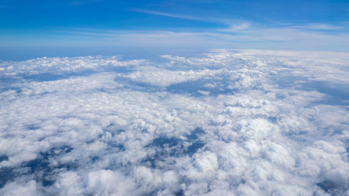 Aerial view of clouds over blue sky