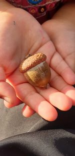 Close-up of hand holding bread