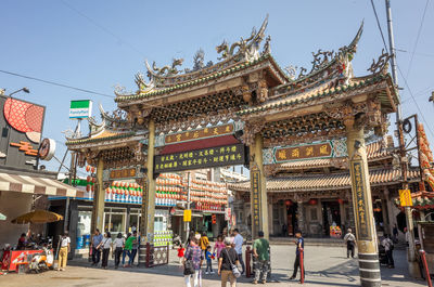 Group of people in front of building