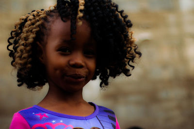 Portrait of girl with frizzy curly hair