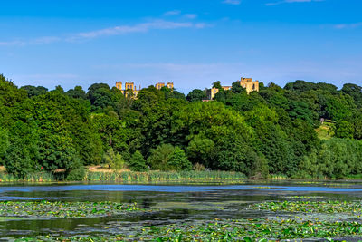 A view of hardwick hall from the lakes.