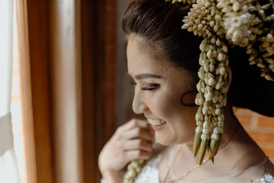 Close-up of woman looking at camera