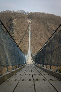 Footbridge over footpath