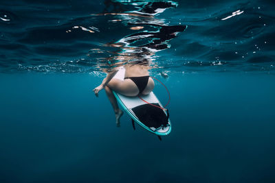 Man swimming in sea