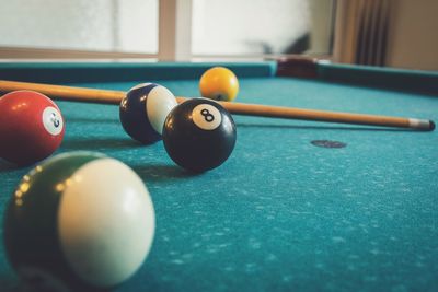 Close-up of balls on pool table