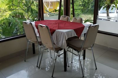 Empty chairs and table at home