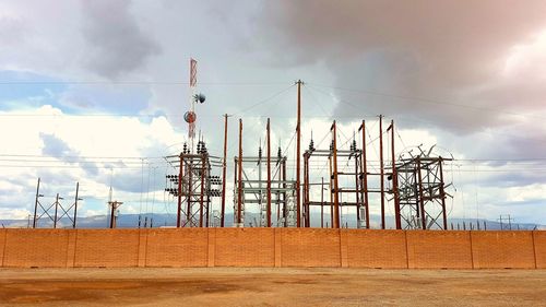 Electricity pylon against sky