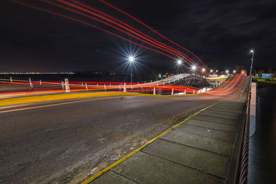 Light trails on road at night