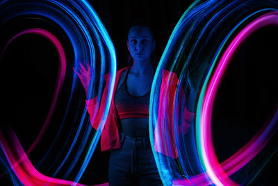 Close-up of light trails against black background