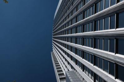 Low angle view of modern building against clear sky