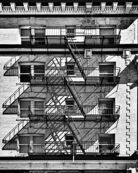 Low angle view of fire escape stairs on a building