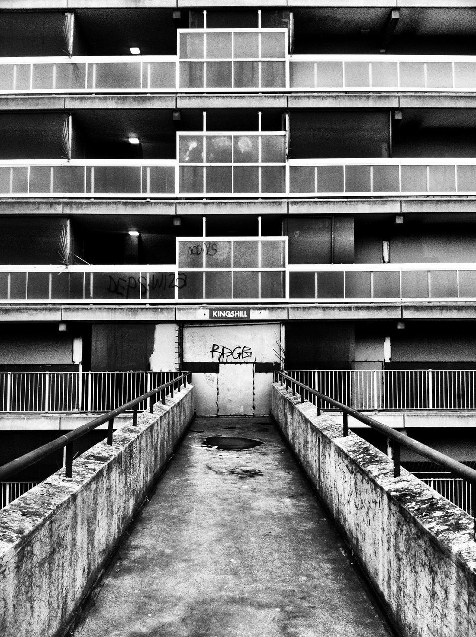 architecture, built structure, building exterior, building, railing, city, steps, the way forward, staircase, steps and staircases, residential building, window, modern, diminishing perspective, residential structure, day, text, low angle view, brick wall, outdoors