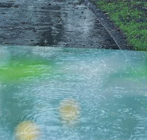 Close-up of water flowing in swimming pool