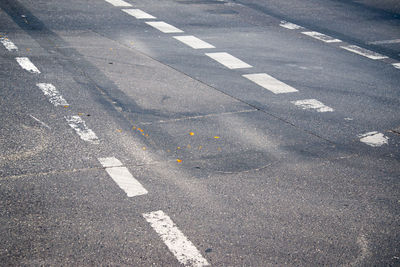 High angle view of arrow symbol on road