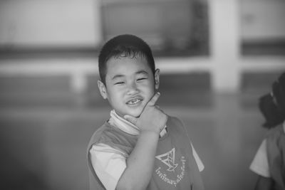 Portrait of boy standing outdoors