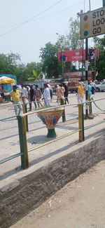 Group of people on road in city