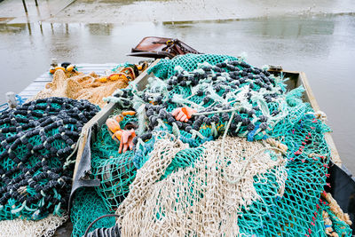 Fishing net in boat at harbor