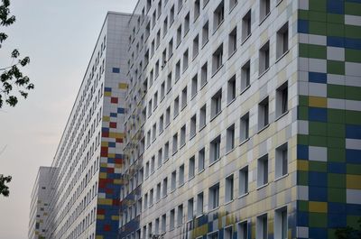 Low angle view of modern building against sky