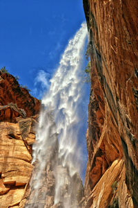 Low angle view of waterfall