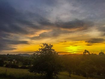 Scenic view of landscape against cloudy sky