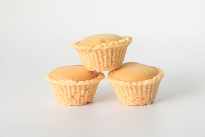 Close-up of cupcakes against white background
